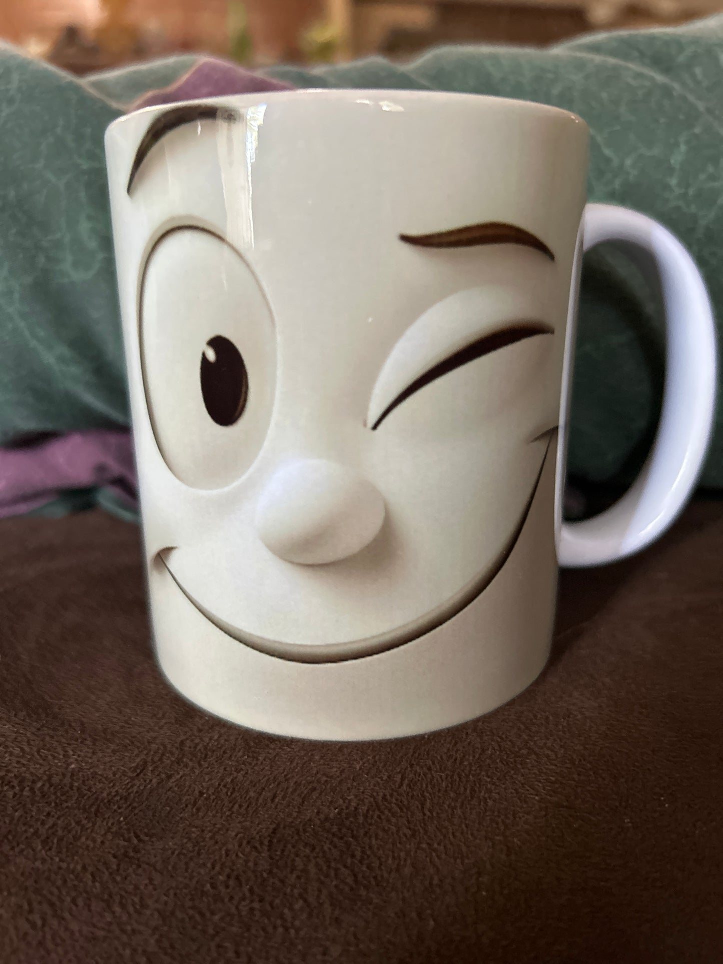 Winking cup